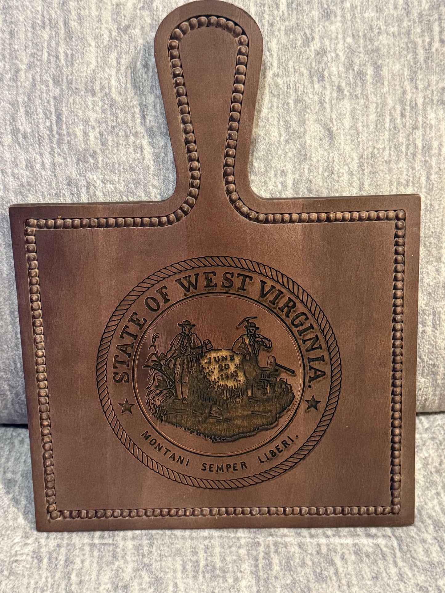Cutting board with West Virginia state seal